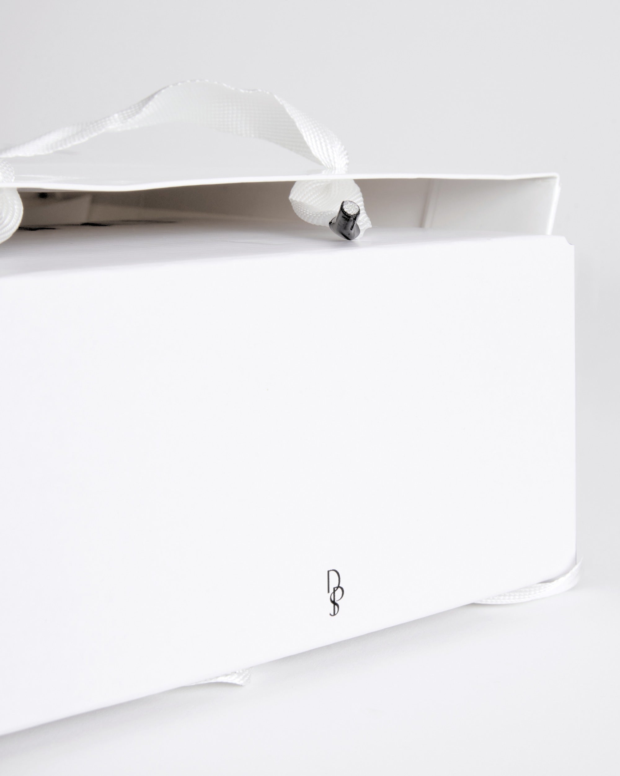 Sac contenant une boite Dupuis